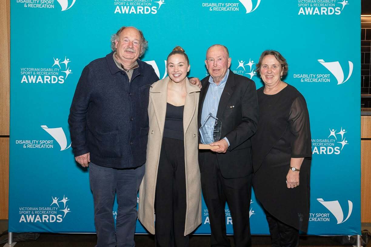 Peter pictured with friends and family